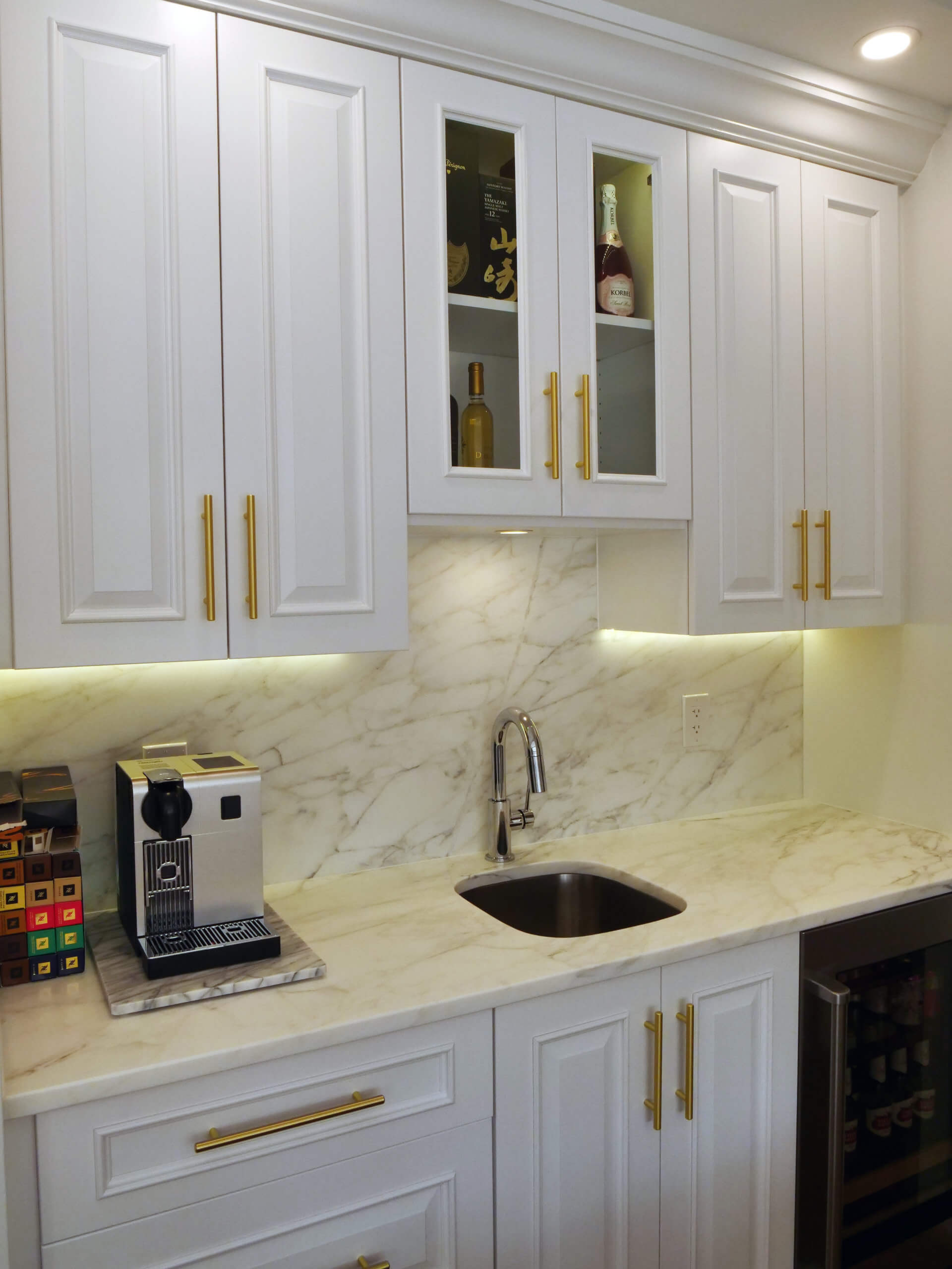 kitchen with Marble white counter and cabinets in newly remodeled kitchen