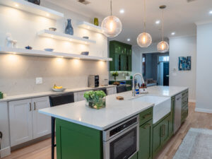 two tone kitchen design with white and green cabinets