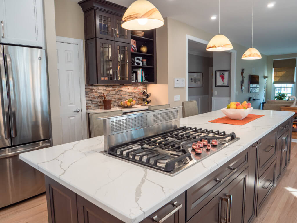 Renovated kitchen with plenty of natural light and custom cabinet height