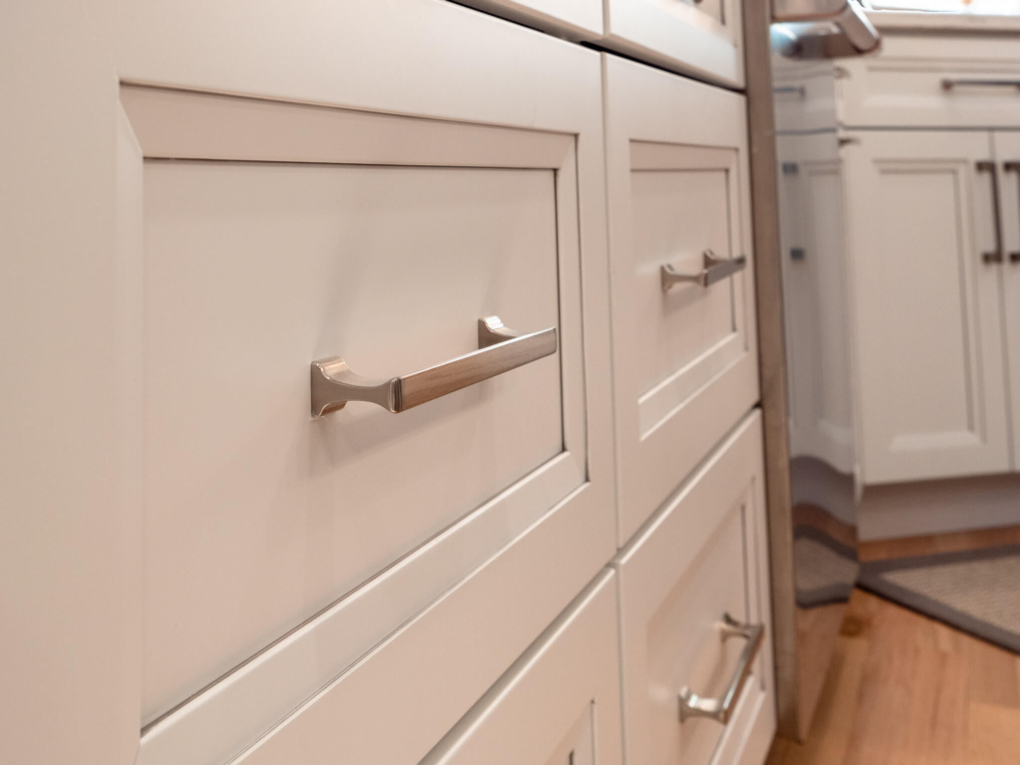 closeup view of kitchen cabinets in white