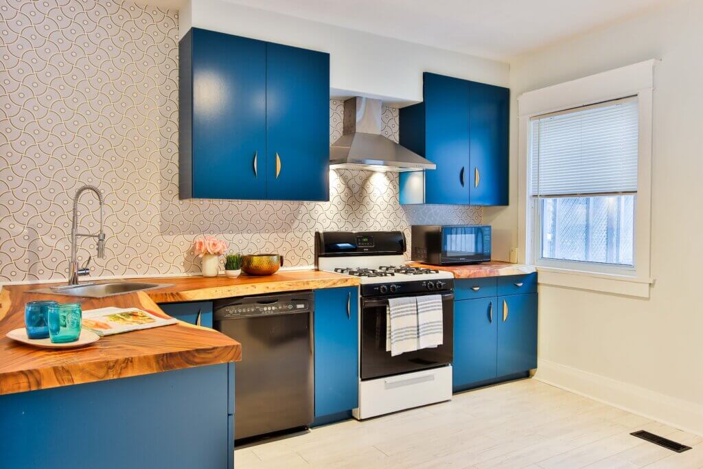 Bold and Vibrant kitchen design with wooden cabinets
