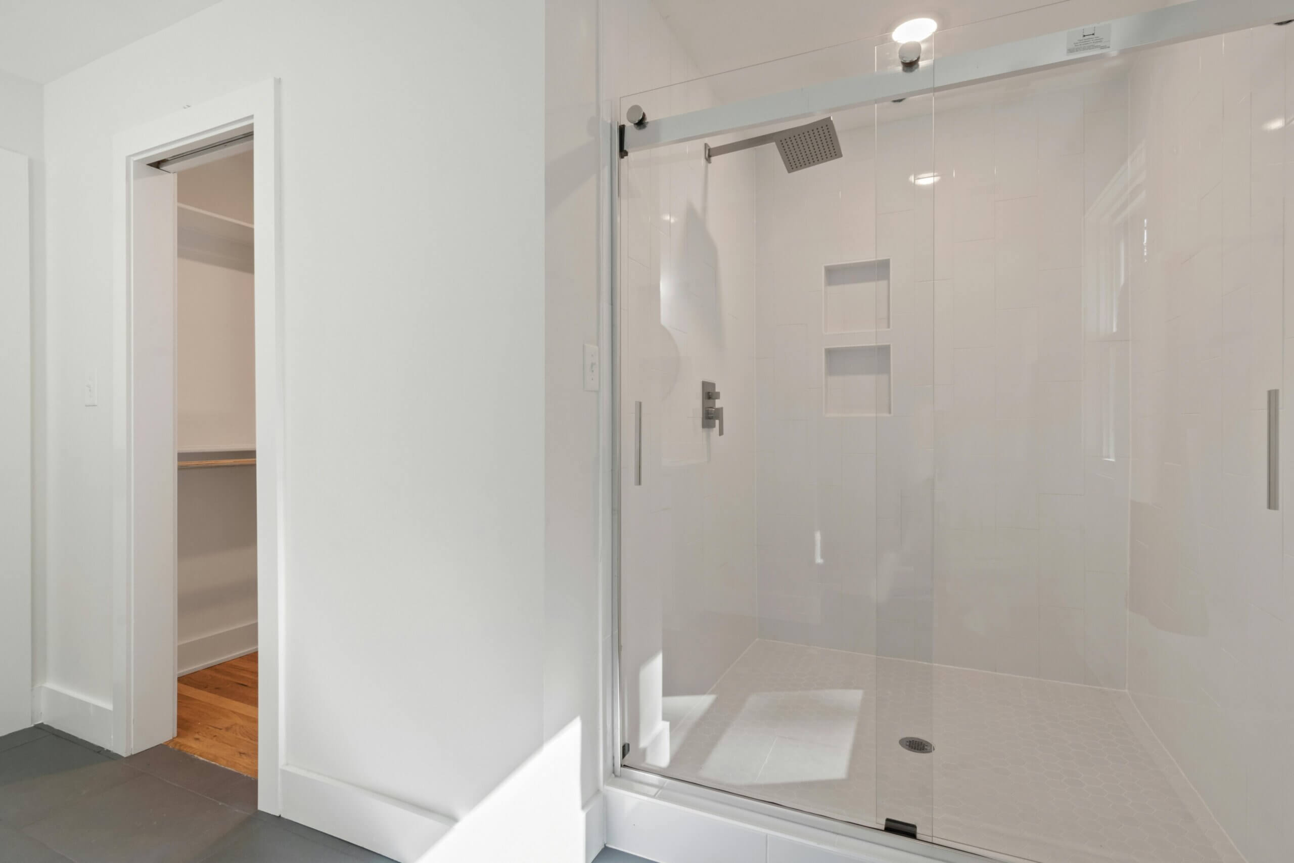 classic white bathroom with rain shower