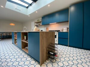 modern kitchen with blue drawers and cabinets