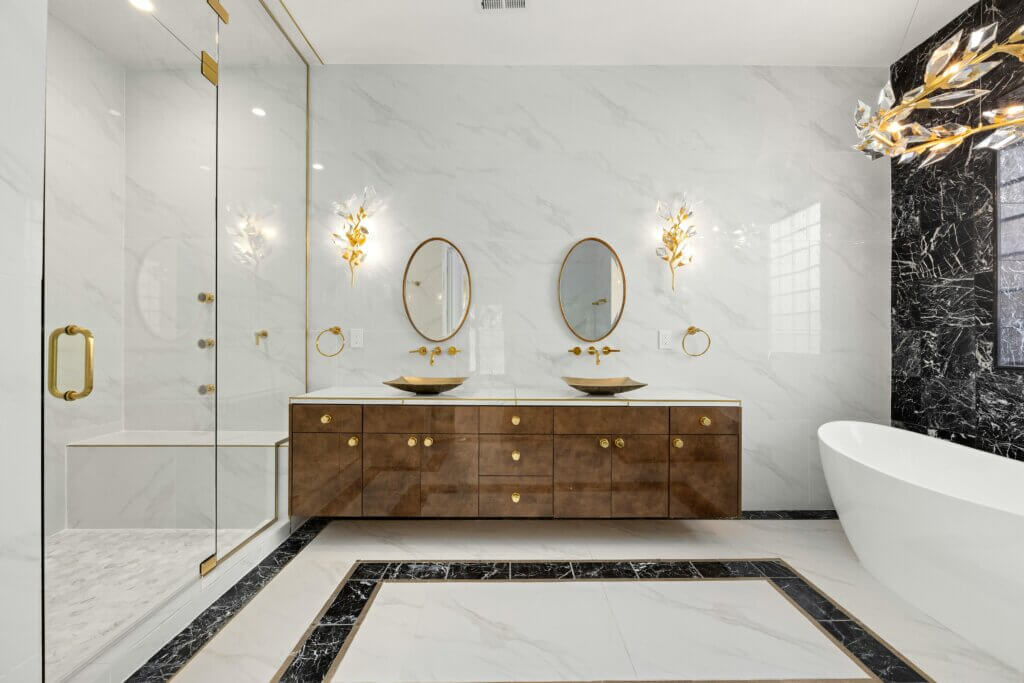 Classic bathroom design with marble floors and walls and vintage vanity