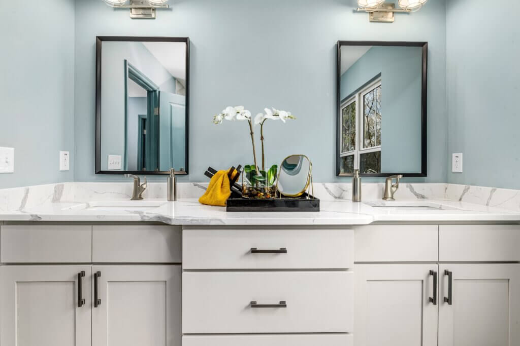 Double vanity with neutral tone cabinets and classic appeal