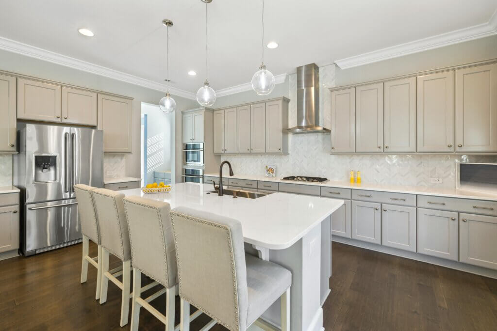 Classic Elegance white kitchen design with off-white cabinetry 