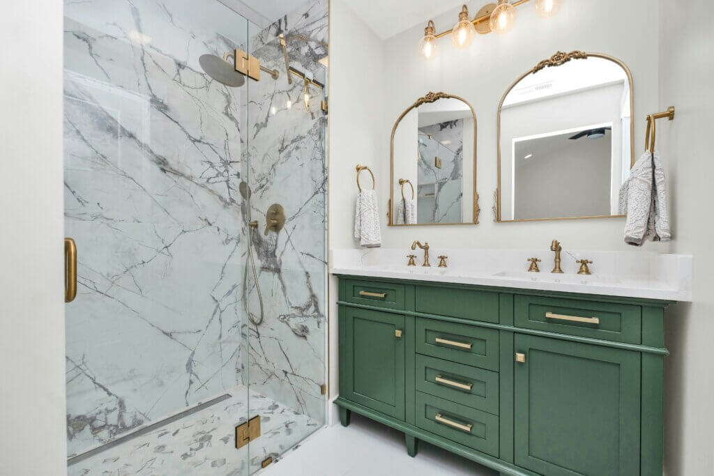 Double bathroom vanity with green bathroom cabinet with golden knob