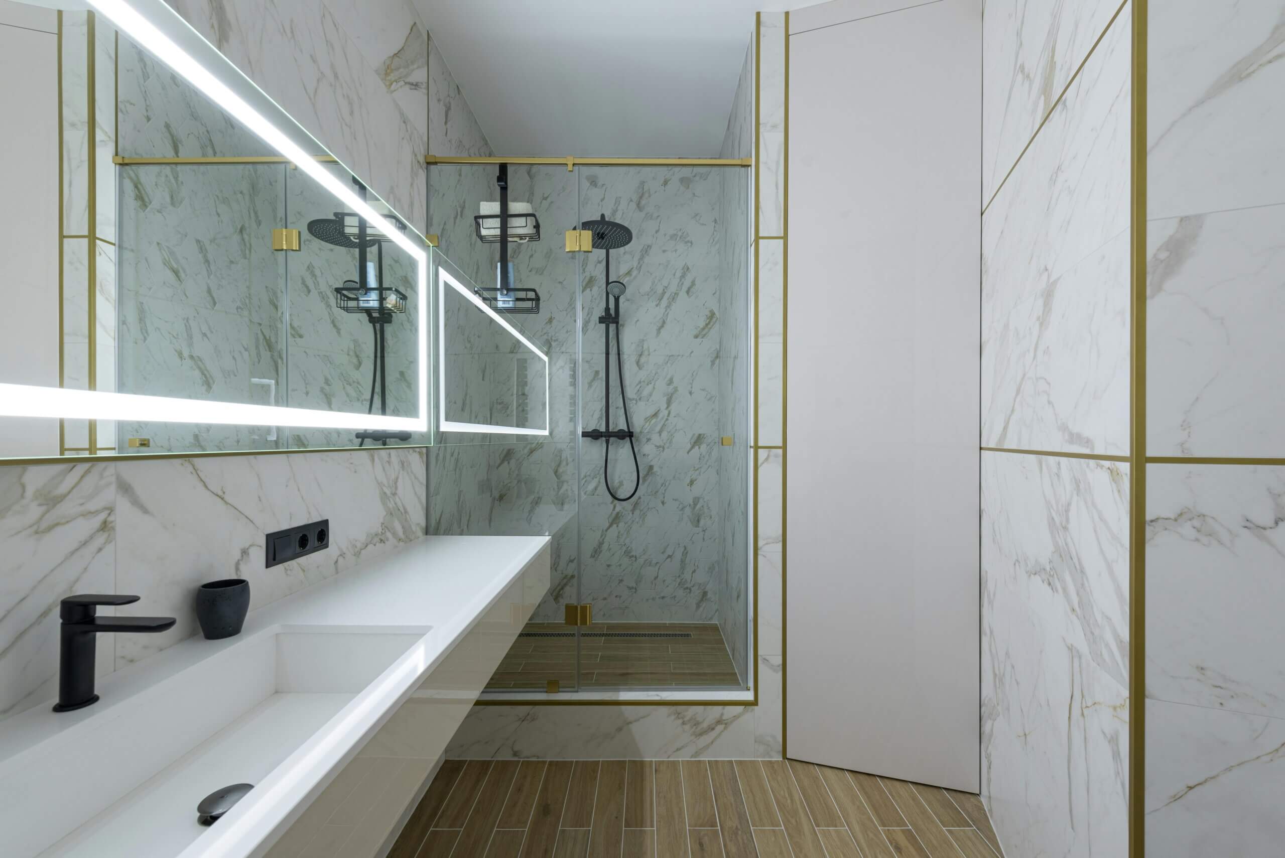 Modern bathroom shower with marble tiles