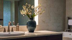 modern bathroom featuring a decorative vase on the countertop