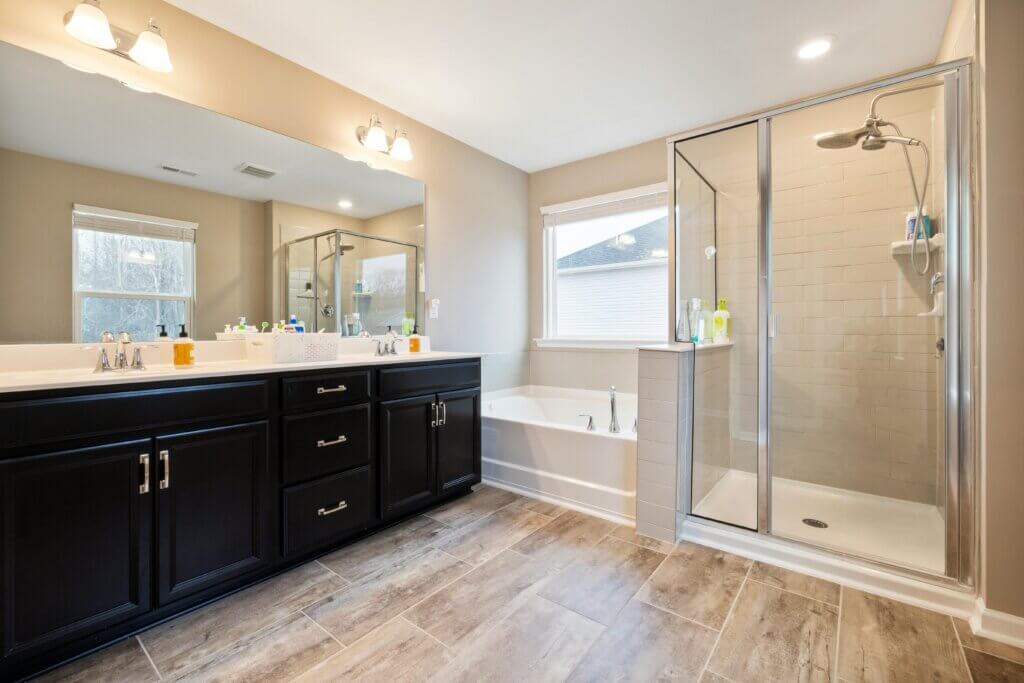 Elegant bathroom with engineered hardwood flooring