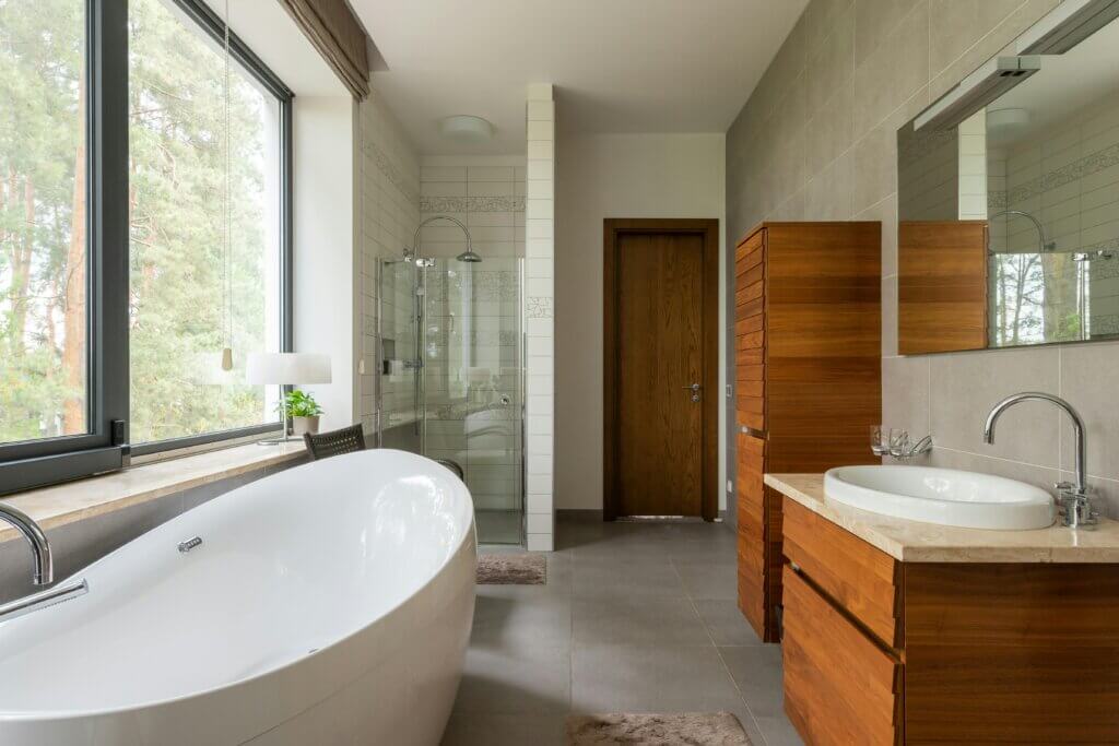 Modern bathroom with ceramic floor tiles, quality materials and fixtures