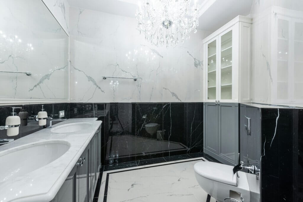 Elegant bathroom with a crystal chandelier and double vanity