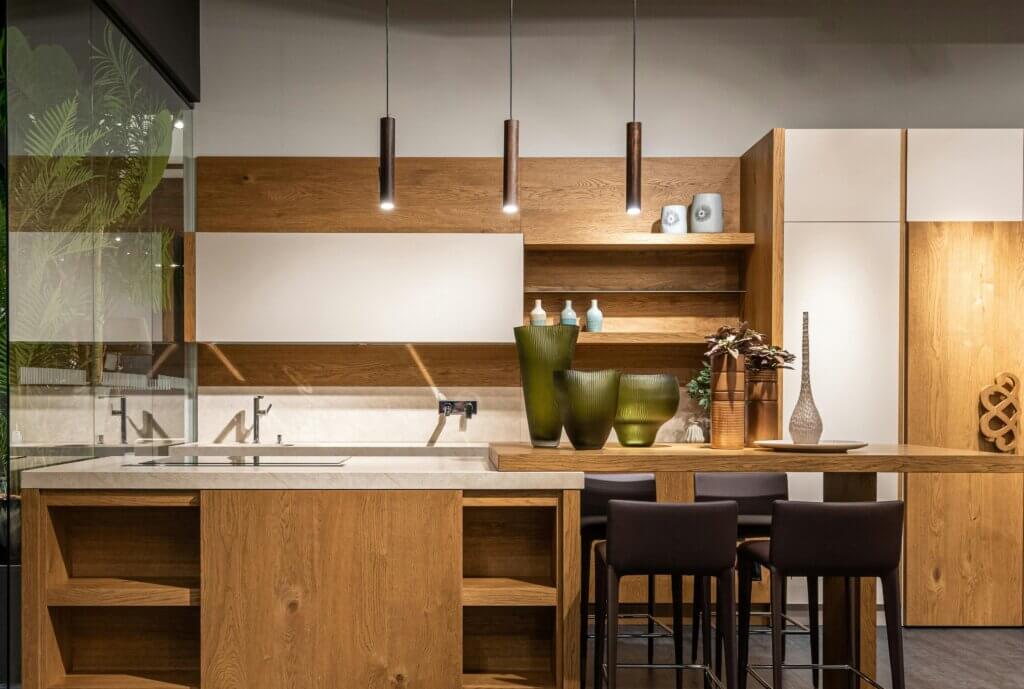 Contemporary kitchen with mixed material island