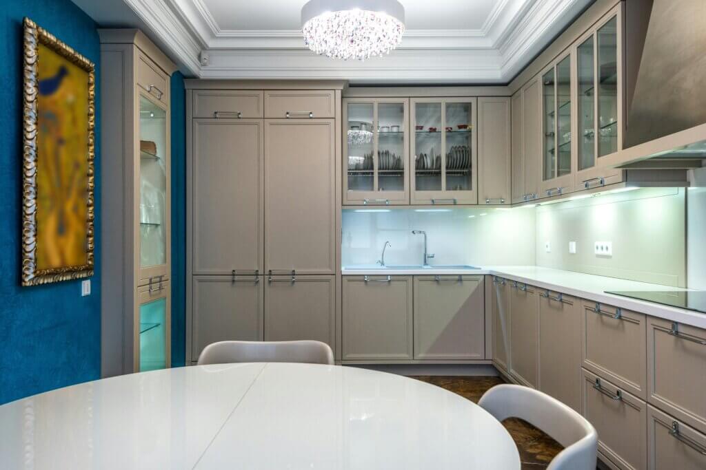 Elegant kitchen with glass-front cabinets 