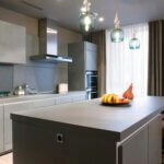 Minimalist kitchen in gray color scheme and modern kitchen cabinet style