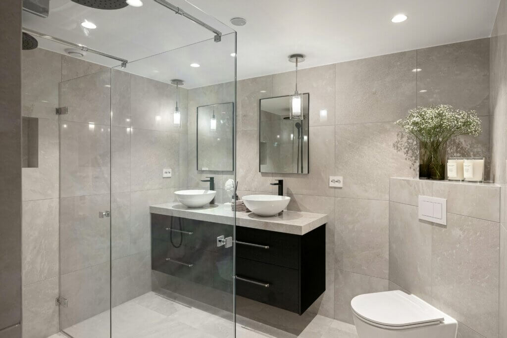 Contemporary bathroom with ample lighting