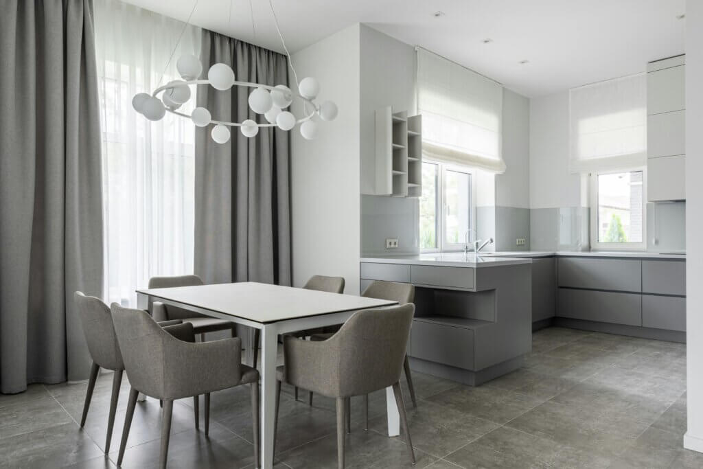 Minimalist kitchen with polished concrete floor tile