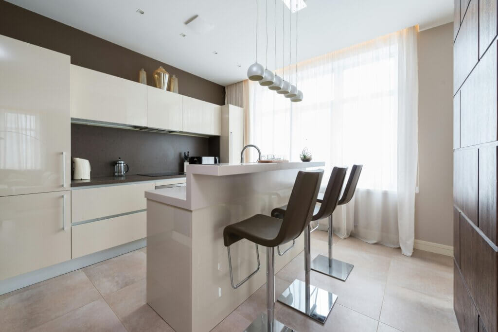 Modern kitchen in soft beige color scheme