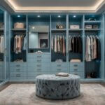 luxurious walk-in closet painted in baby blue with ambient lighting and metallic accents