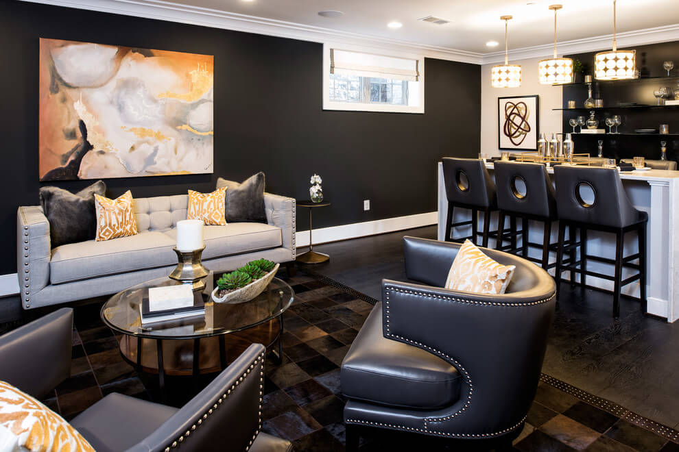 Elegant basement in black and white color scheme with lough and mini bar